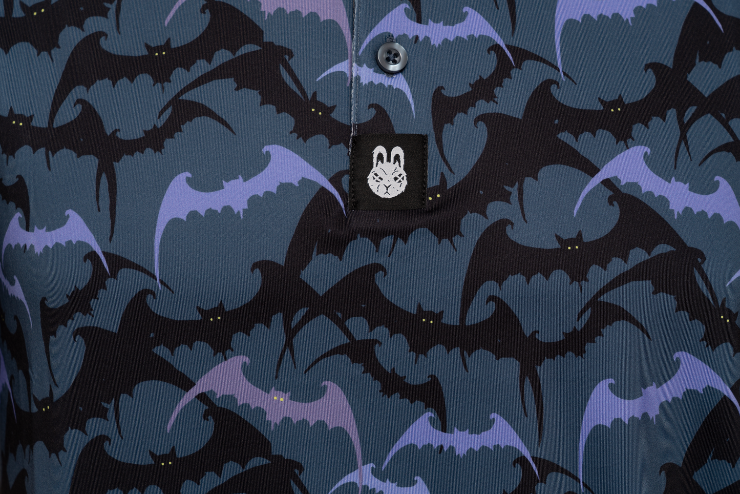 Close-up of Batman golf polo chest detail – subtle design elements with a clean finish, adding edge and character to your golf look.