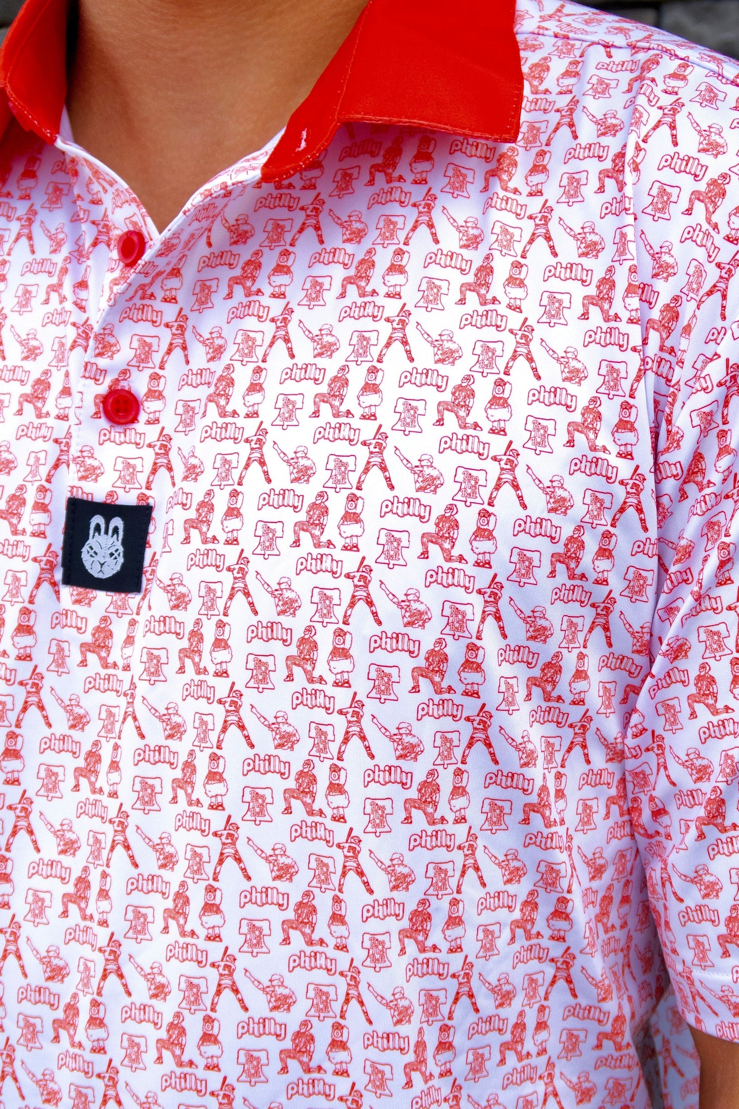 Alternate front angle of The South Philly Sandlot golf polo by City Golf Collective showing collar and button detail.