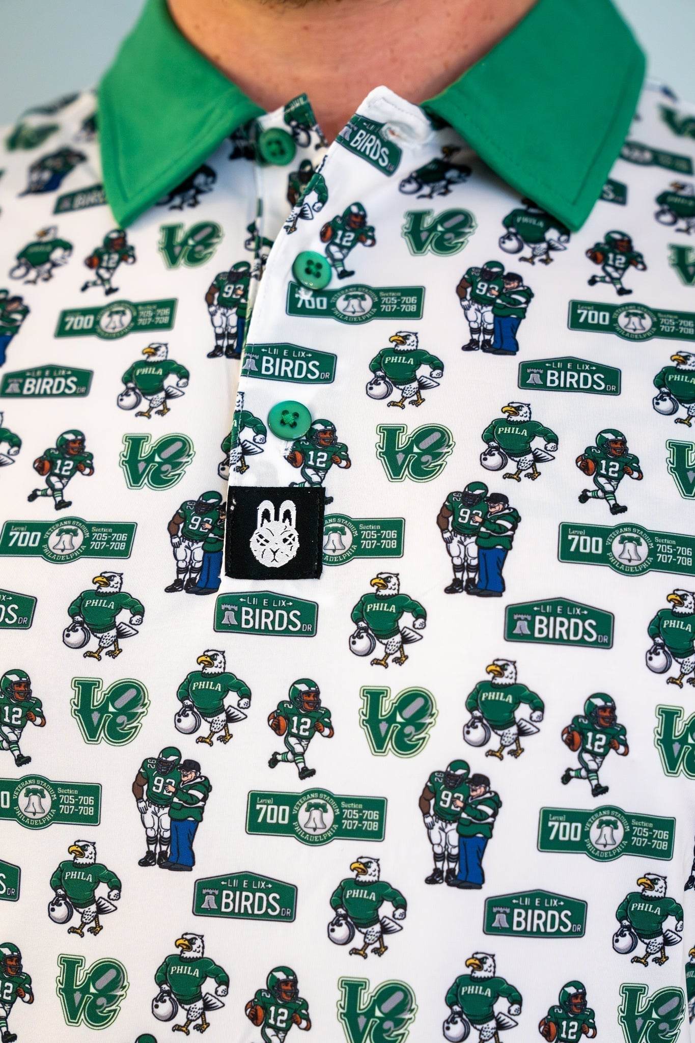 Close-up of The 700 Level Classic Polo front design by City Golf Collective showing detailed Philly-inspired pattern and premium fabric