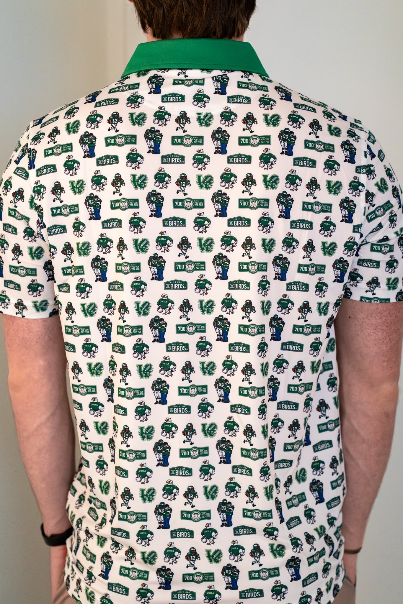 Full back view of The 700 Level Classic Polo by City Golf Collective displaying rear design and overall fit