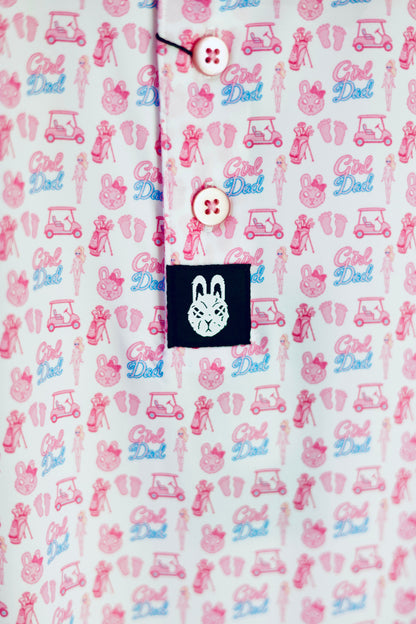 Close-up of The Girl Dad Polo showcasing the playful all-over print, premium buttons, and City Golf Co. logo tag.