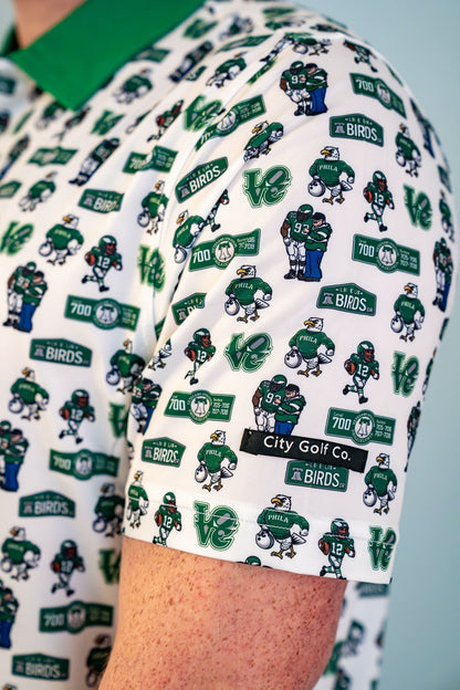 Side view of The 700 Level Classic Polo by City Golf Collective highlighting fit, sleeve detail, and tailored silhouette