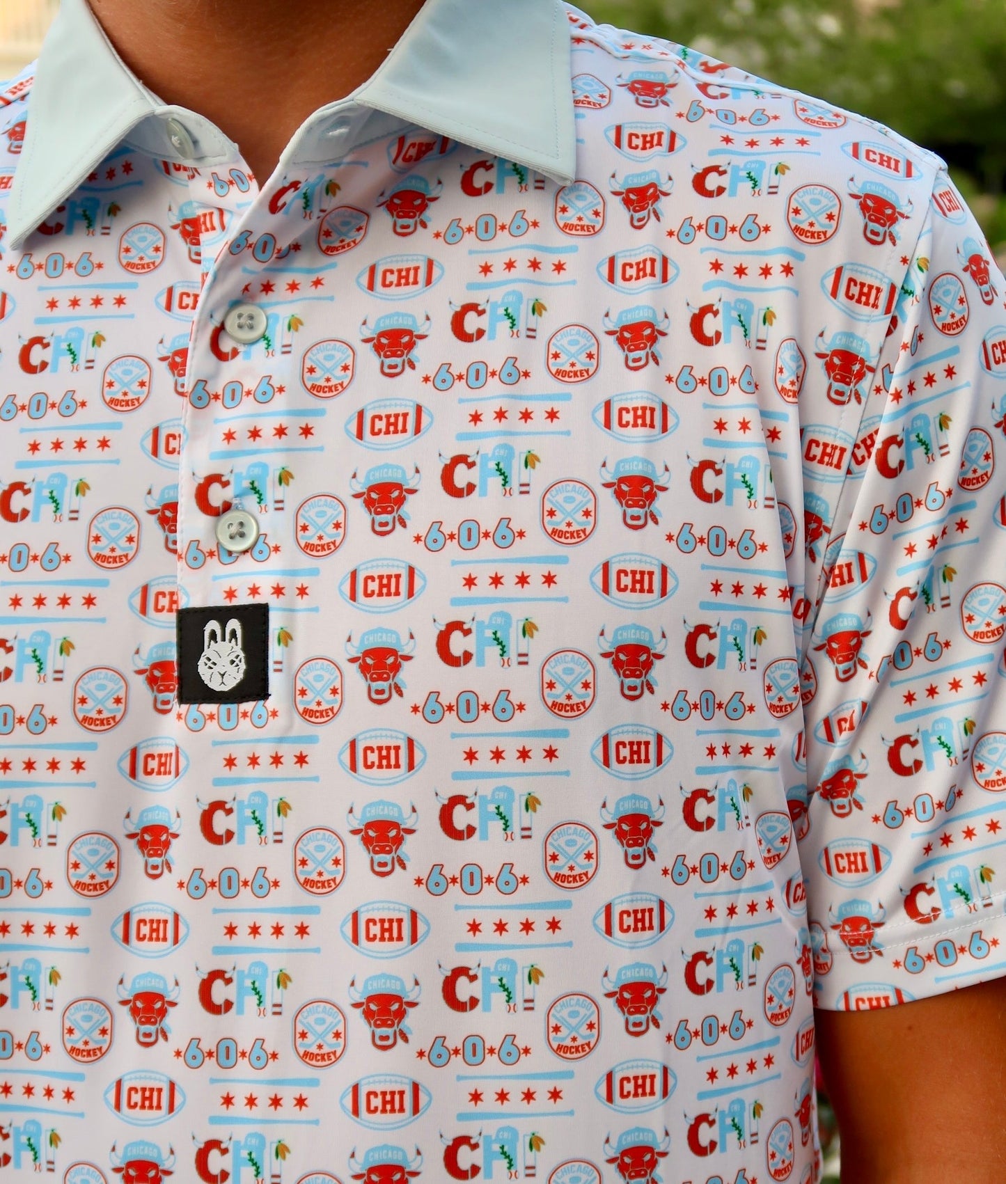 Close-up of the Second City Swing Chicago inspired men’s golf polo by City Golf Collective showing logo and fabric.