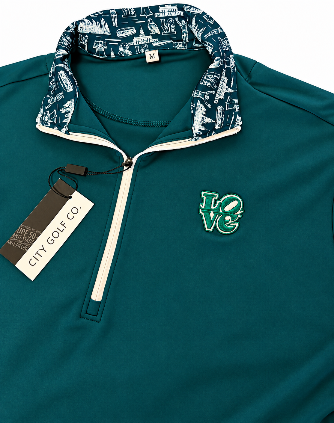 The Philly Heritage Zip Up quarter-zip pullover in teal fabric, with a white patterned collar lining and embroidered LOVE emblem.