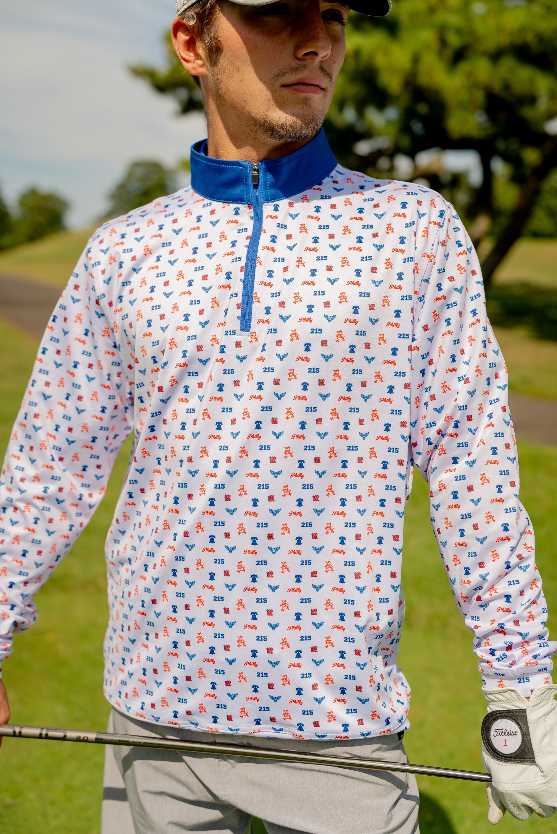 Front view of The Phrenetic Zip Quarter Zip men’s golf pullover by City Golf Collective showing logo and modern fit