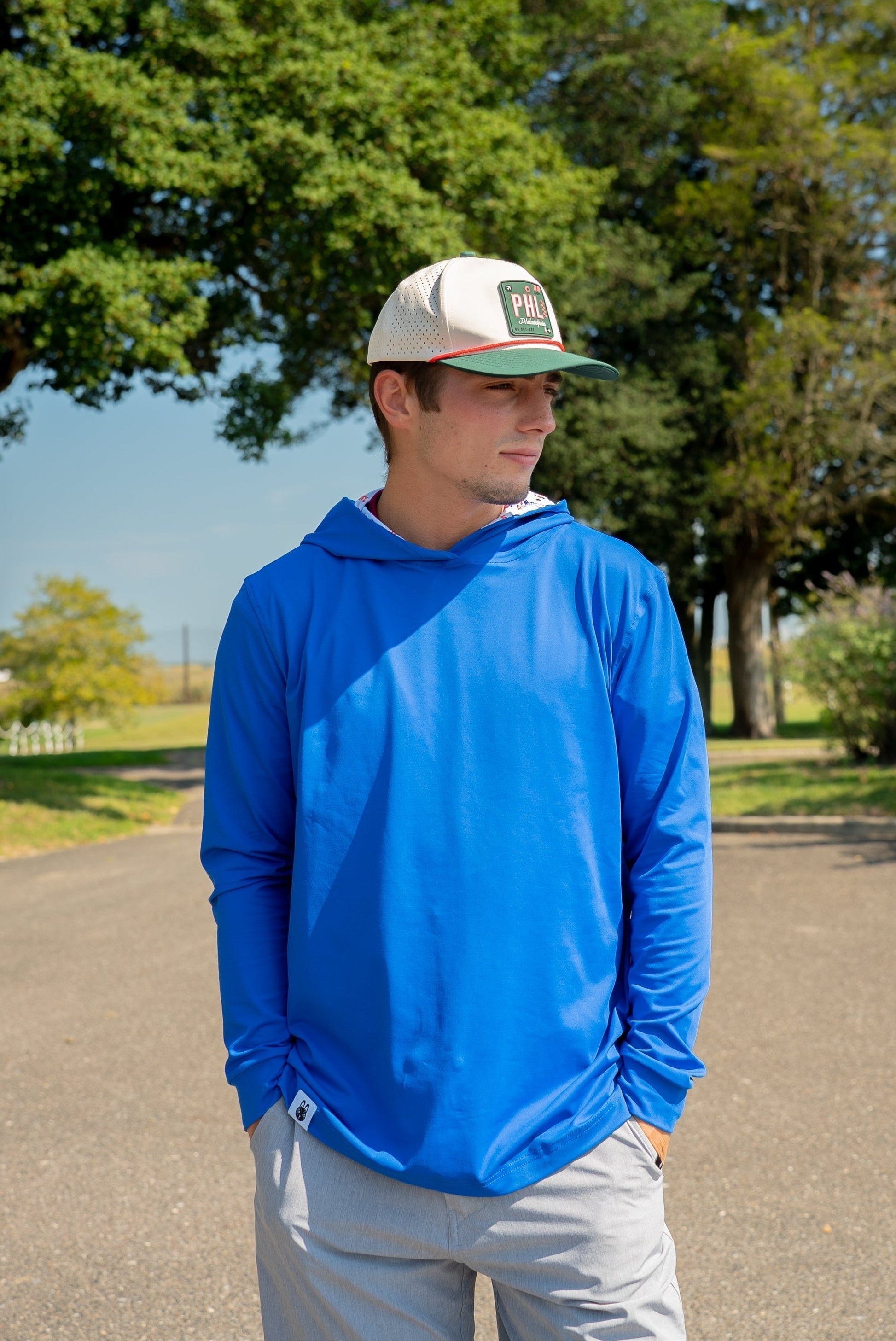 Front view of the Philly Phrenetic After Hours Philadelphia golf hoodie by City Golf Collective featuring logo and performance fit