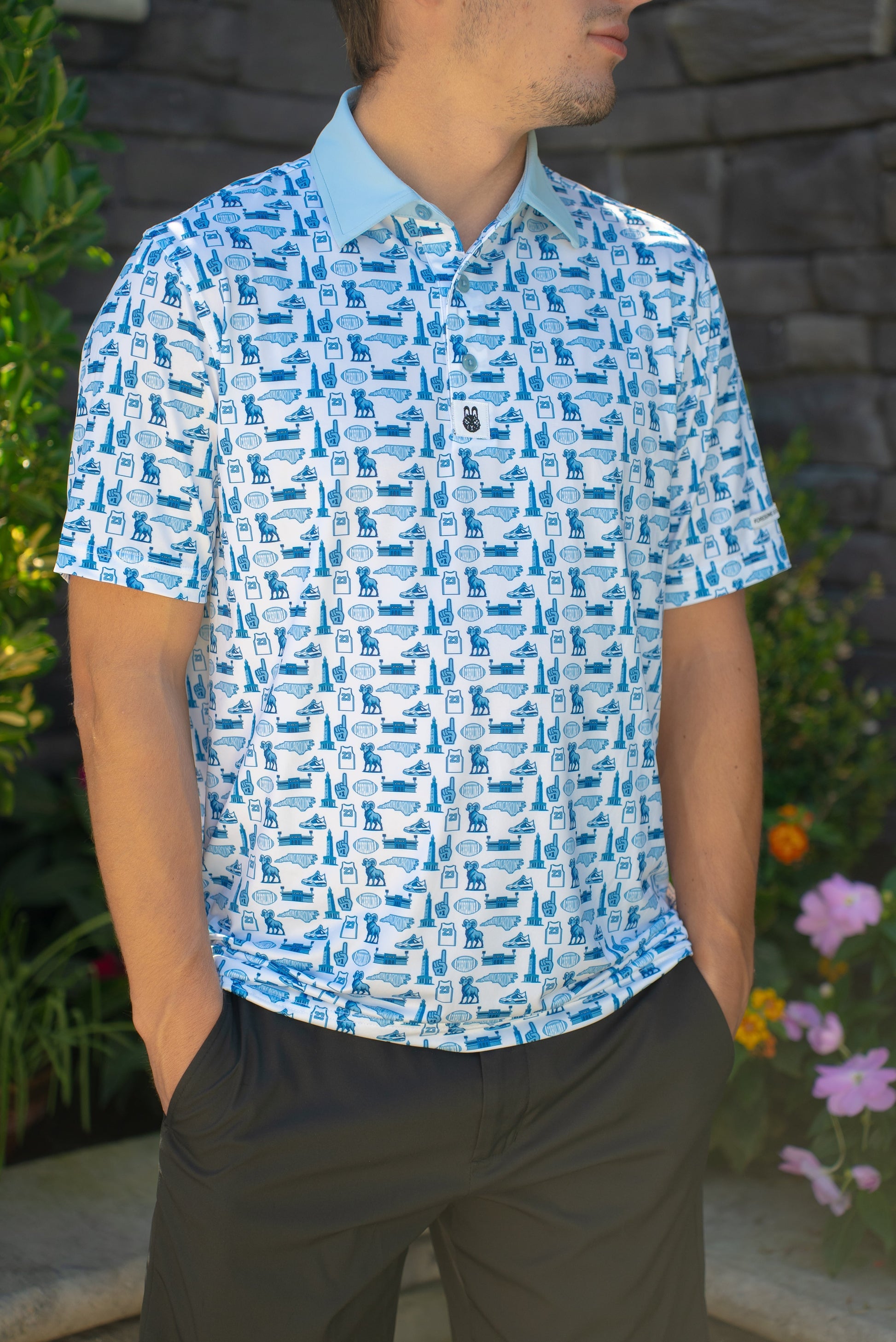 Front view of the Chapel Hill Hangtime UNC-inspired men’s golf polo by City Golf Collective