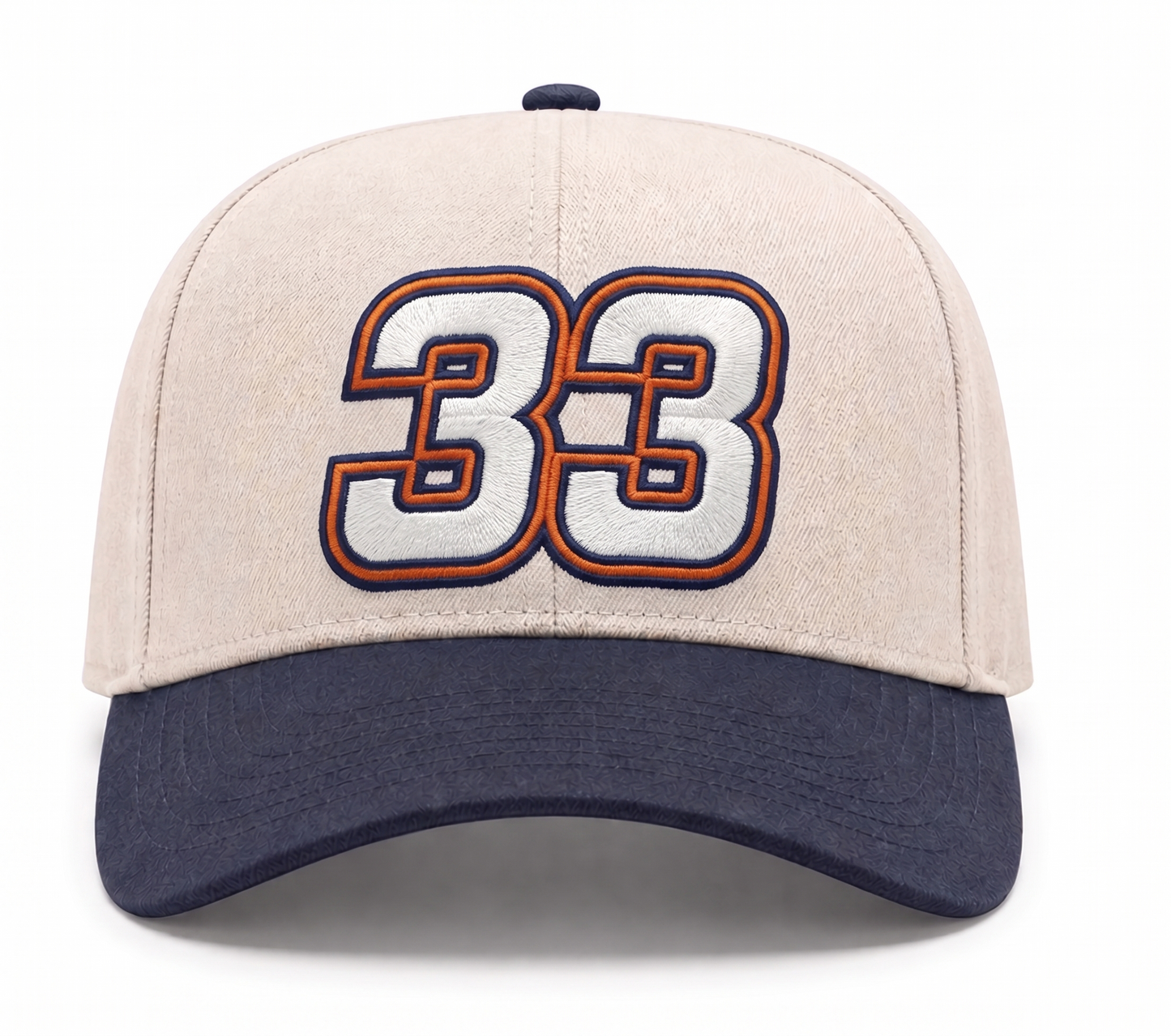 City Golf Collective #33 Mallozzi racing golf hat with cream crown, navy brim, and orange outlined 33 embroidery front view