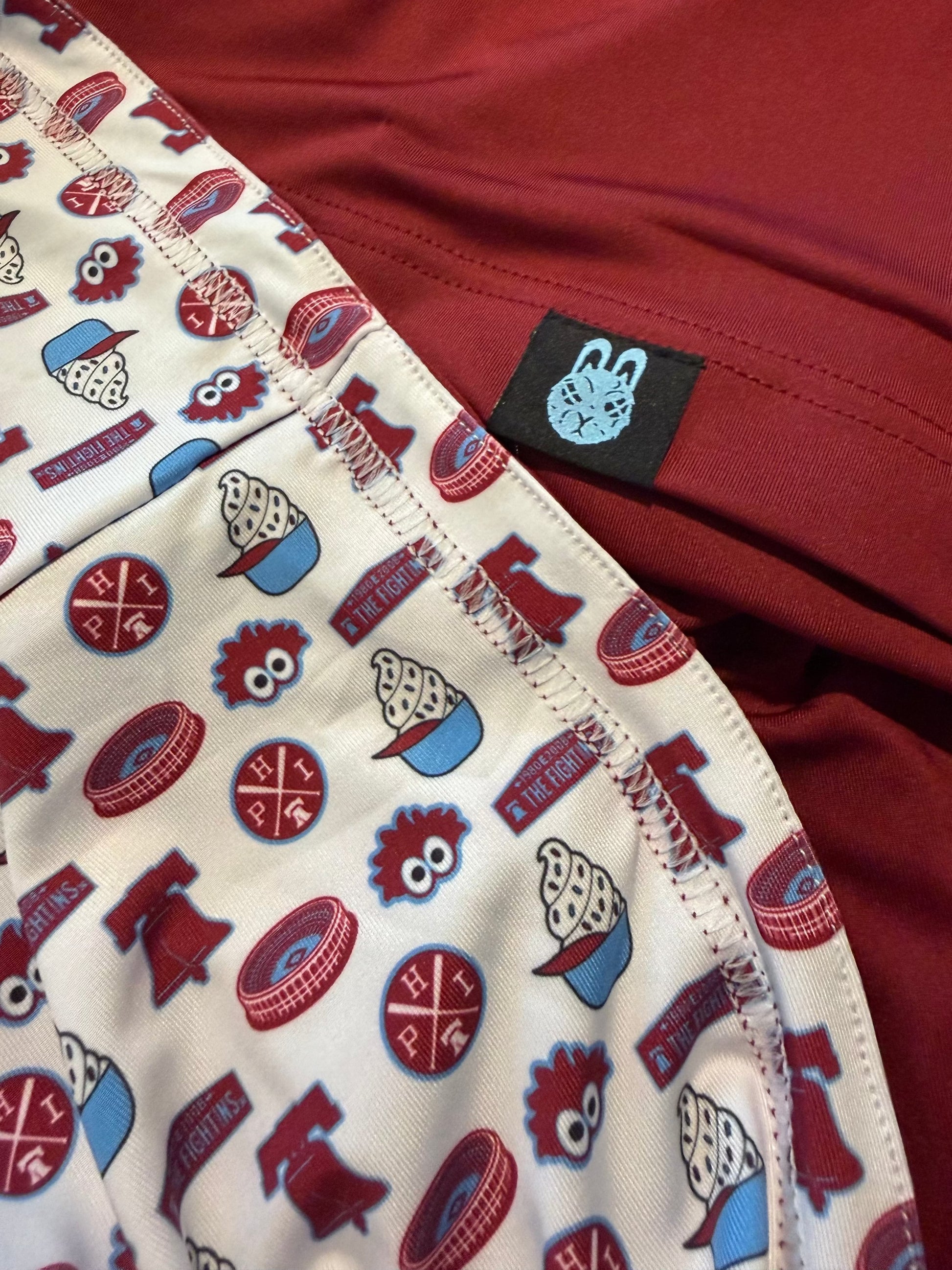 The Pattison Classic Hoodie by City Golf Collective in maroon with custom Fall Classic patterned hood detail.
