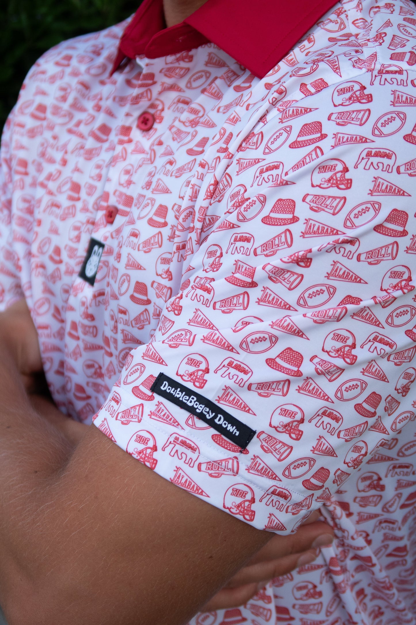 Side view of the Saturdays in Tuscaloosa Alabama men’s golf polo by City Golf Collective showing fit and sleeve detail.