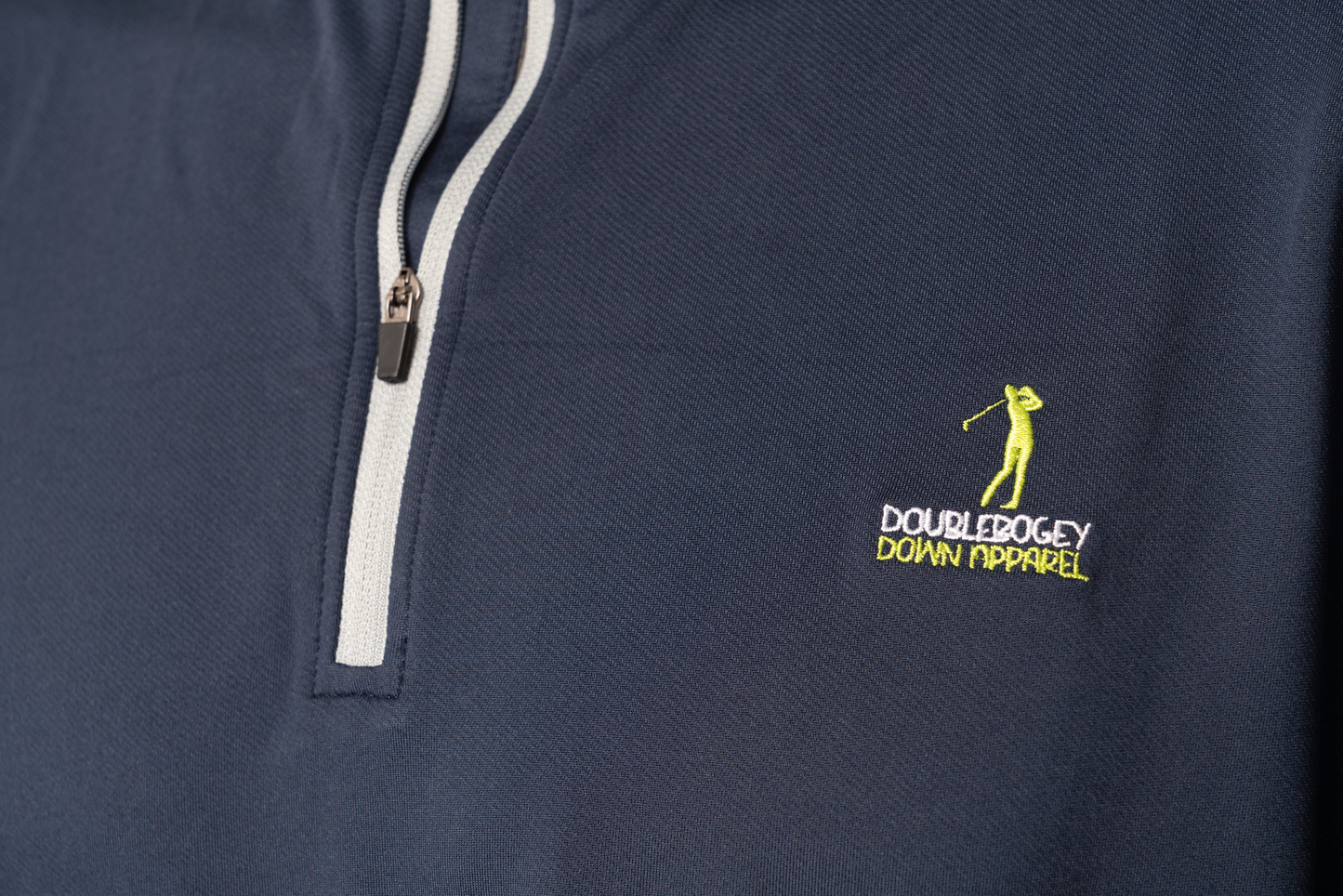 Close-up front of The Back Nine Zip – athletic fit, premium zipper, and soft performance fabric ideal for golfing and everyday wear