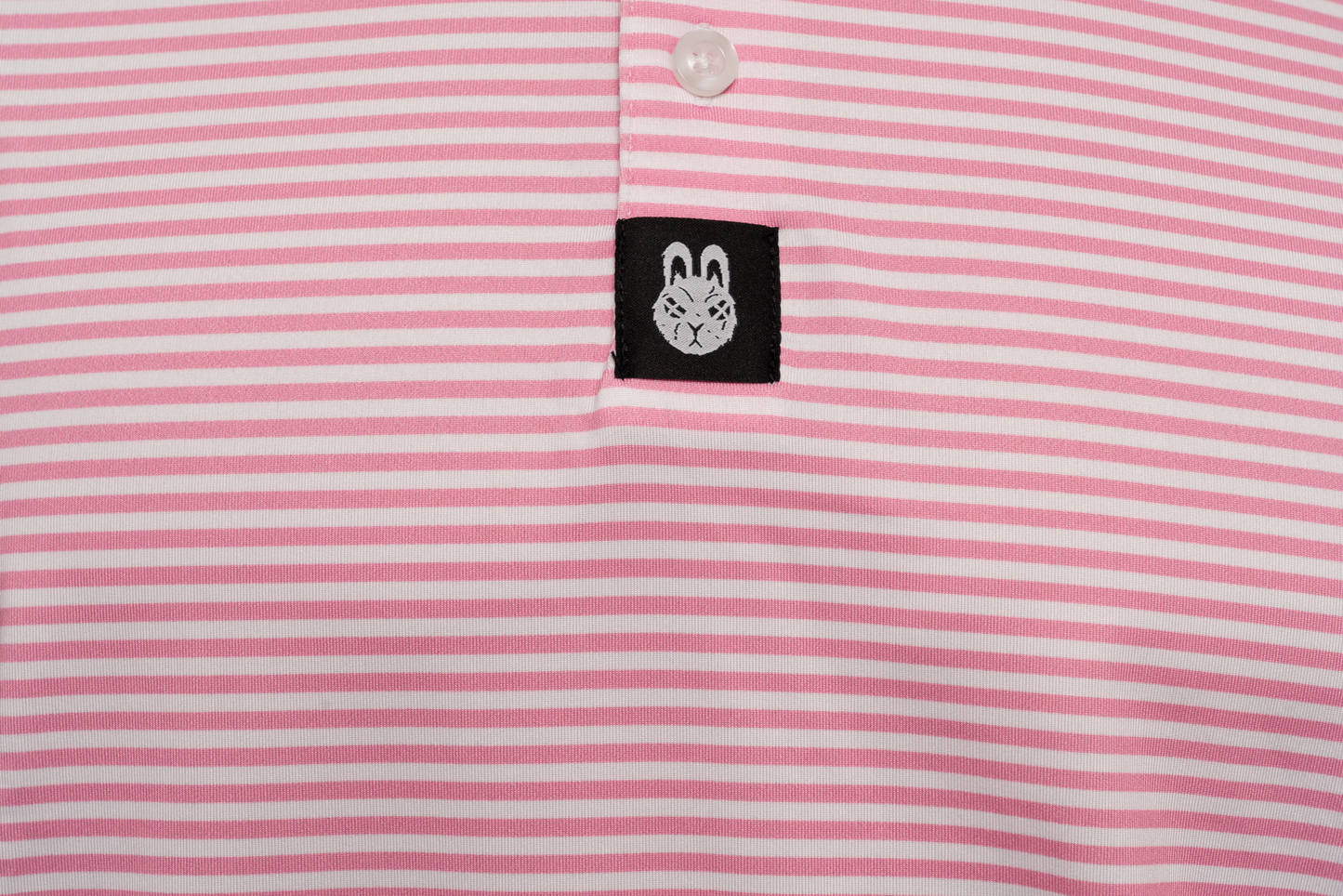 Detailed view of the Yacht Rock Golf Polo’s collar and embroidered logo, adding a touch of style and sophistication to your golf wardrobe.